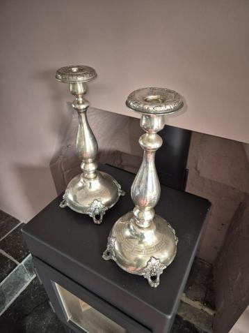 zilveren kandelaren beschikbaar voor biedingen