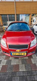 Chevrolet Aveo 1.2 16V 5D 2009 Rood nieuwe APK tot feb 2027, Auto's, Chevrolet, Voorwielaandrijving, 40 €/maand, Aveo, 4 cilinders
