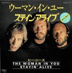 Bee Gees – The Woman In You / Stayin' Alive (Japan 1983), 7 inch, Single, Ophalen of Verzenden, Zo goed als nieuw