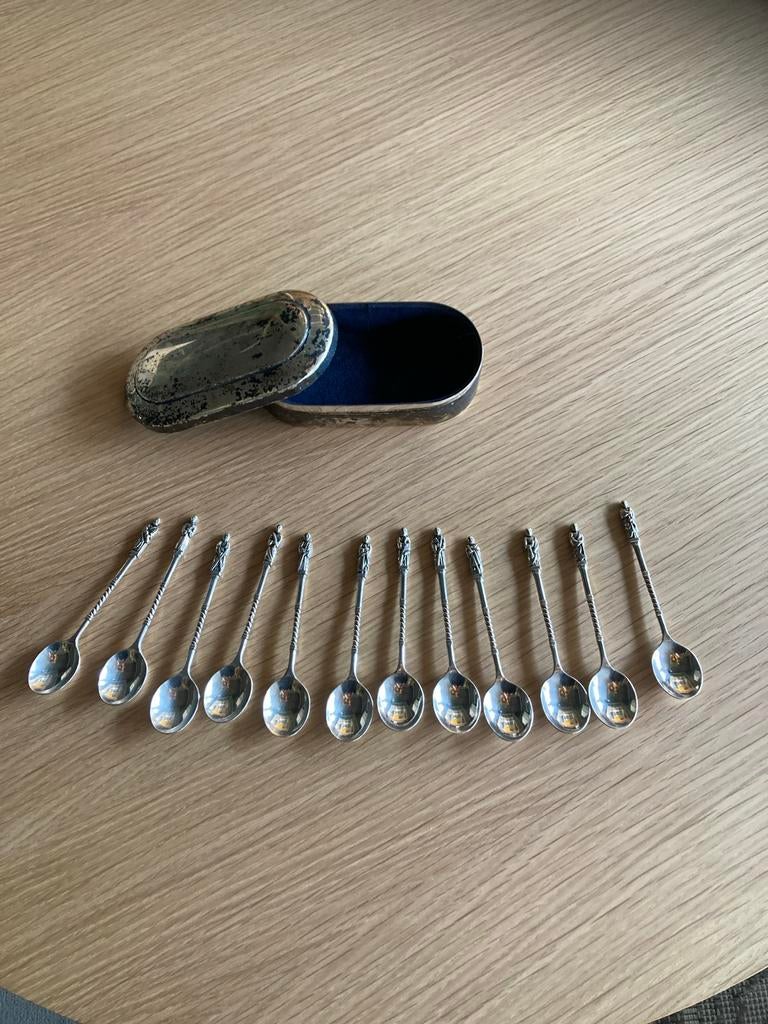 Set van 12 verzilverde apostel theelepeltjes, Ophalen