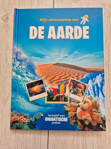Mijn uitvouwatlas van de aarde beschikbaar voor biedingen
