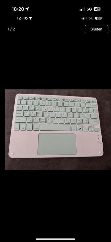 Draadloos toetsenbord met touchpad beschikbaar voor biedingen