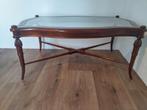 Glazen salontafel, Ophalen