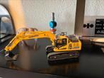 Komatsu HB215 Hybrid 1:50, Hobby en Vrije tijd, Ophalen of Verzenden, Zo goed als nieuw