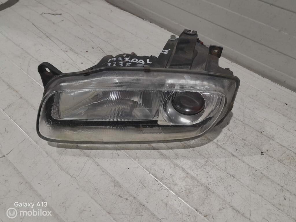 Koplamp Mazda 323F, Gebruikt, Ophalen of Verzenden