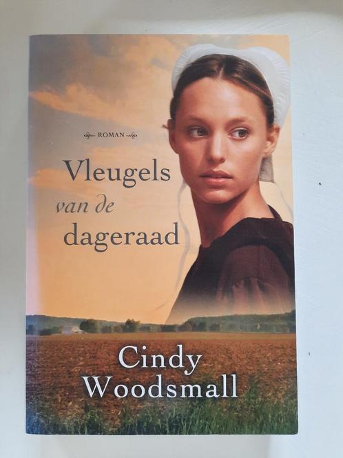 Cindy Woodsmall - Vleugels van de dageraad, Boeken, Romans, Zo goed als nieuw, Nederland, Ophalen of Verzenden