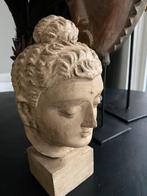 Boeddha hoofd op sokkel, Ophalen