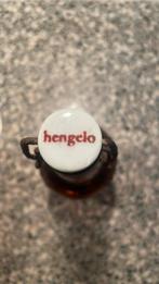 Oude beugel fles van hegelo’s bier, Ophalen
