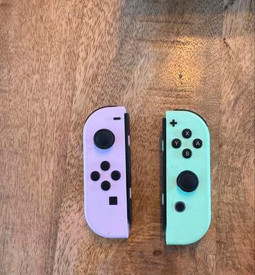 Officiële Nintendo Losse joy con roze/groen beschikbaar voor biedingen