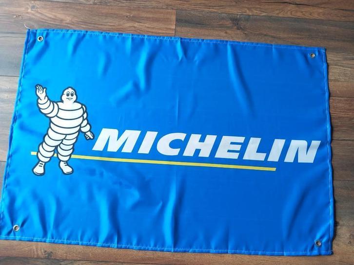DE MICHELIN MAN BANNER 60X90 MET BEVESTIGGINGS OGEN, Auto diversen, Wieldoppen, Nieuw, Ophalen of Verzenden