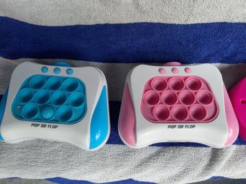 Pop or Flop Gameconsole roze en blauw – Spel beschikbaar voor biedingen