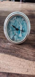 Wekker uit Lourdes, Ophalen