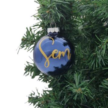 Kerstbal blauw met naam beschikbaar voor biedingen