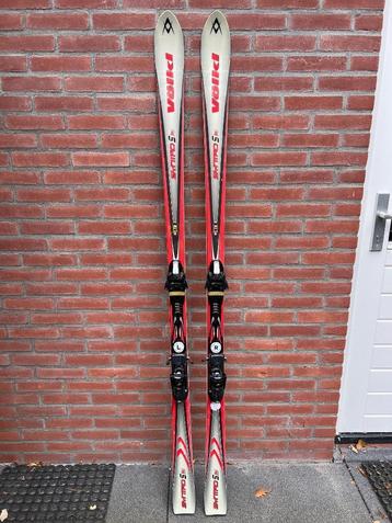 Ski's, schoenen en stokken maat 44 beschikbaar voor biedingen