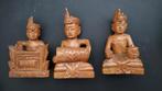 Drie  beeldjes van gamelan, Indonesie, Ophalen