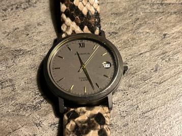 Prisma titanium horloge beschikbaar voor biedingen