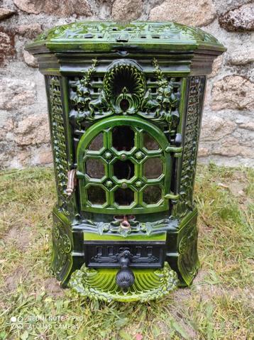 Schitterende unieke antieke emaille Art-deco houtkachel  beschikbaar voor biedingen