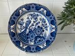 Handgeschildeerd delfts blauw bord met paradijsvogel, Ophalen