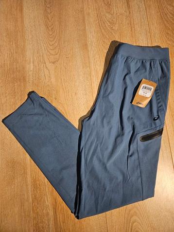 Asics Trainingsbroek Blauw Joggingsbroek Maat M (Medium) beschikbaar voor biedingen