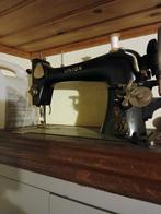 Antieke  naaimachine union, Ophalen