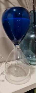 Moses zandloper loopt 1 uur, Ophalen