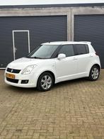 Suzuki Swift 1.3 5D 2009 Wit, Auto's, Suzuki, Voorwielaandrijving, Euro 5, Zwart, 400 kg