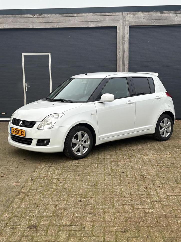 Suzuki Swift 1.3 5D 2009 Wit, Auto's, Suzuki, Bedrijf, Swift, ABS, Airbags, Airconditioning, Alarm, Bluetooth, Boordcomputer, Centrale vergrendeling