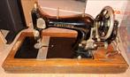 Antieke Gritzner naaimachine, Ophalen