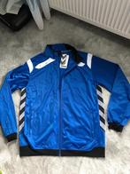 Nieuw blauw trainingsjasje v. Hummel mt L, Maat 52/54 (L), Blauw, Nieuw, Ophalen of Verzenden