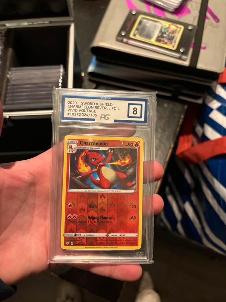 Charmeleon reverse holo graded, Hobby en Vrije tijd, Verzamelkaartspellen | Pokémon, Zo goed als nieuw, Meerdere kaarten, Foil