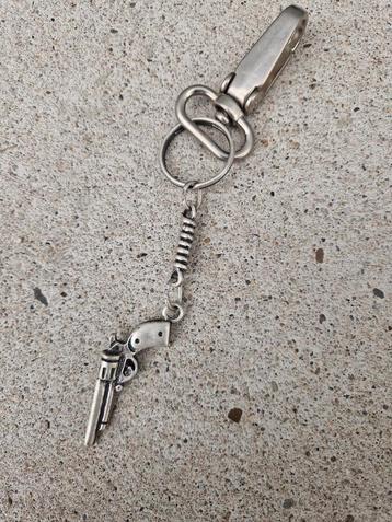 Western cowboy country sleutelhanger revolver  pistool beschikbaar voor biedingen