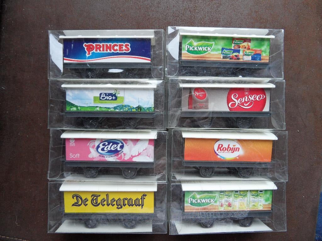 Set met 8 verschillende wagons  met reclame, Overige merken, Gelijkstroom, Ophalen of Verzenden, Nieuw
