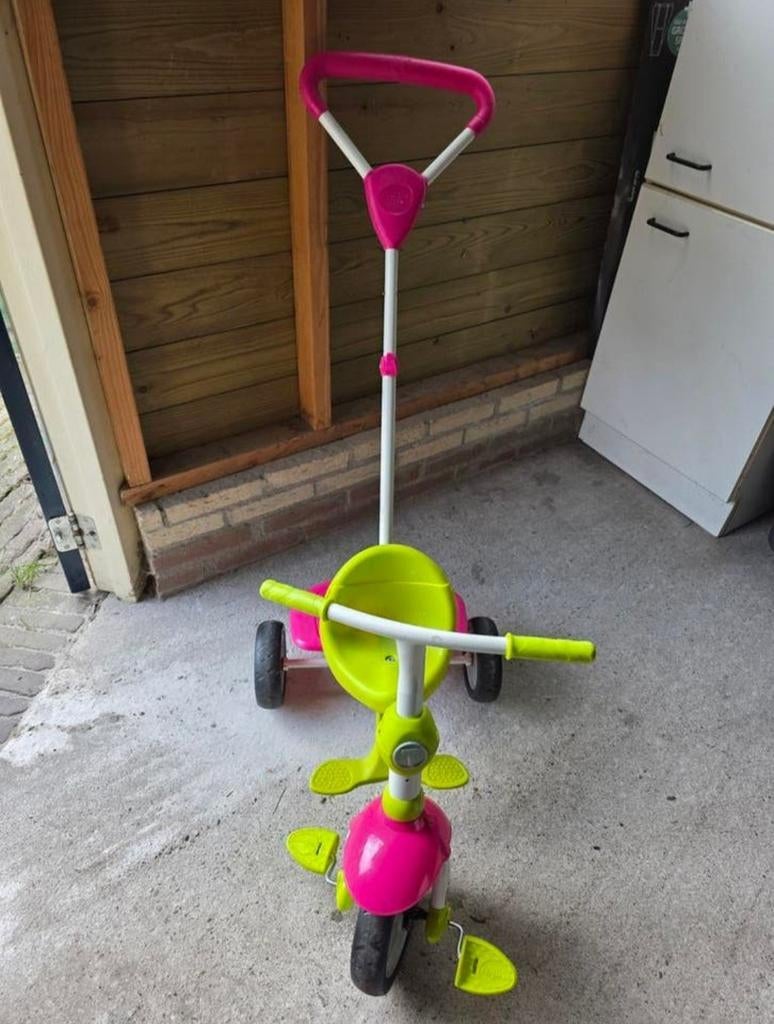 Roze en groene driewieler met duwstang, Fietsen en Brommers, Fietsen | Driewielers, Ophalen, Gebruikt, Duwstang