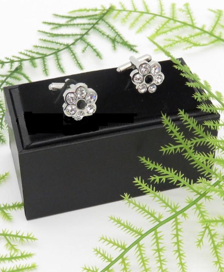 Te koop manchetknopen met een zwart steen en strass stenen., Sieraden, Tassen en Uiterlijk, Manchetknopen, Nieuw, Overige materialen