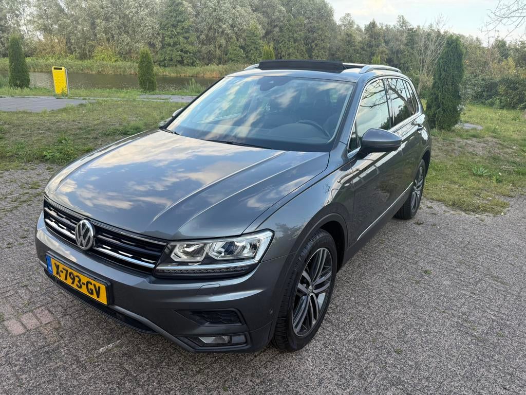 Volkswagen Tiguan 2.0 TSI 180pk DEALEROND PANO MEMORY LEER, Auto's, Automaat, Zwart, 4 cilinders, 1984 cc