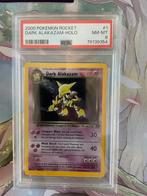 Dark Alakazam Holo PSA 8 - Team Rocket Pokémon Kaart, Ophalen of Verzenden, Zo goed als nieuw, Losse kaart, Foil
