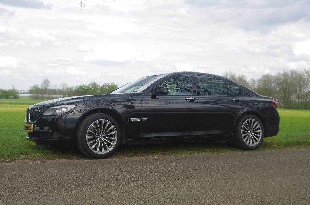 BMW 7-Serie 4.4 I 750 AUT 2009 Zwart, Auto's, Automaat, Euro 5, 4395 cc, Particulier
