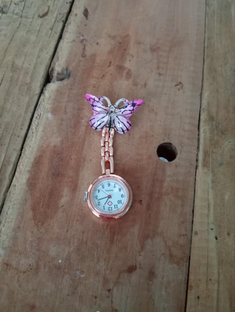 Verpleegkundigen horloge vlinder roze, Ophalen of Verzenden, Nieuw, Staal, Navelpiercing
