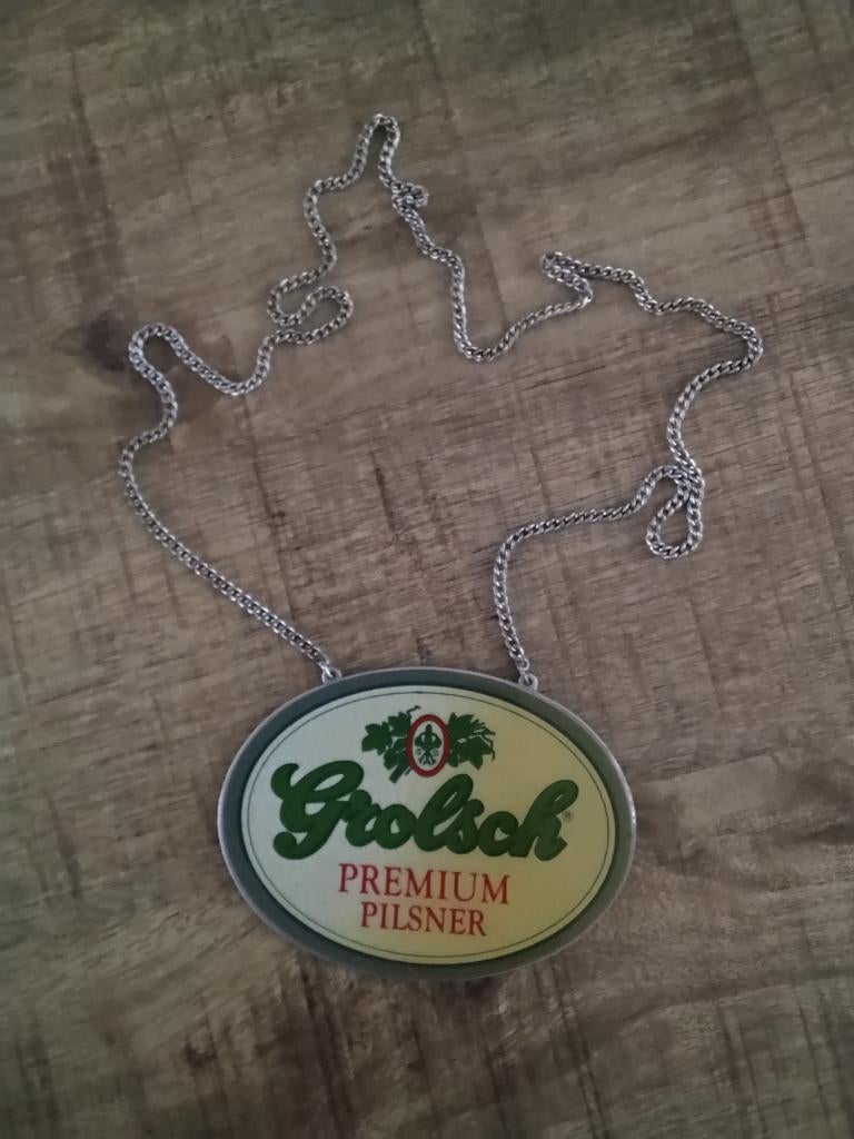 Grolsch premium pilsner tap ruiter aan ketting, Ophalen of Verzenden, Gebruikt, Reclamebord, Plaat of Schild, Grolsch