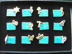 Collectie van 12 WDCC pins met jaartekens, Verzamelen, Ophalen of Verzenden, Overige figuren, Nieuw, Overige typen