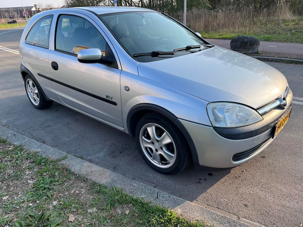 Opel Corsa 1.2 16V 3D 2003 Grijs/trekhaak afn., Auto's, Opel, Voorwielaandrijving, 450 kg, 74 pk, Origineel Nederlands