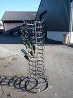 Oud ijzeren flessenrek, Ophalen