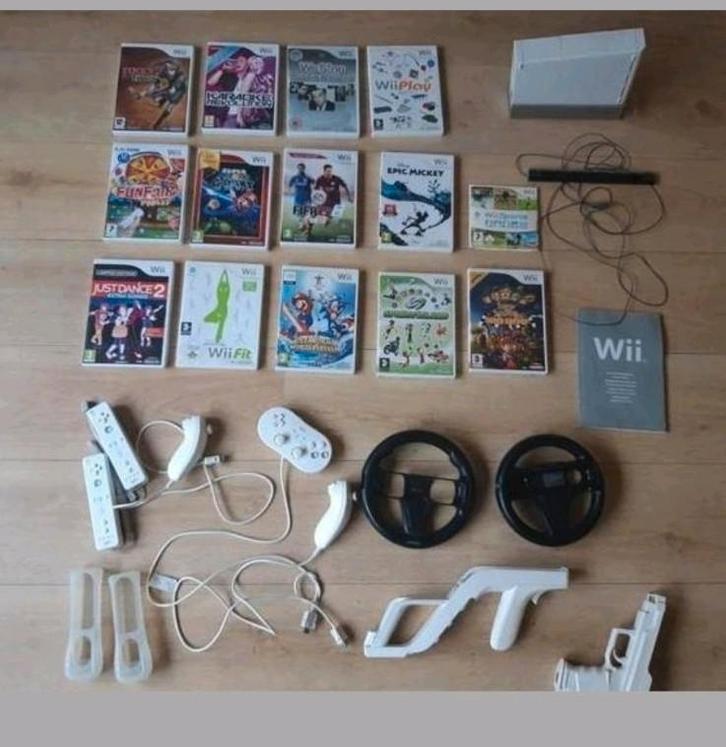 Wii inclusief spellen ,extra sticks, Spelcomputers en Games, Spelcomputers | Nintendo Wii, Zo goed als nieuw, Met 2 controllers