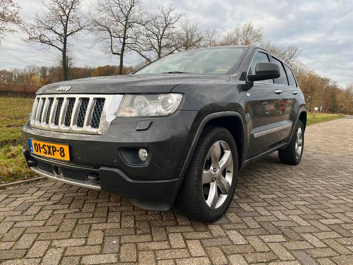 Jeep Grand Cherokee Overland 3.6 V6 AWD AUT 2012 Grijs, Auto's, Jeep, Particulier, Grand Cherokee, 4x4, ABS, Achteruitrijcamera