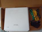 Zyxel T-50 modem met adapter, kabels en ww, Ophalen of Verzenden