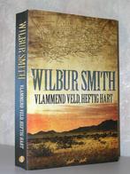Wilbur Smith - Vlammend veld, heftig hart (paperback 2007), Ophalen of Verzenden, Zo goed als nieuw, Nederland