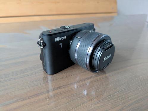 Nikon 1 J3 + 10-30mm

met toebehoren, Audio, Tv en Foto, Fotocamera's Digitaal, Zo goed als nieuw, Compact, Nikon, Geen optische zoom