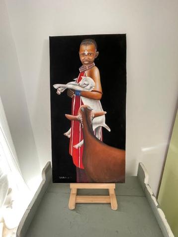 Schilderij op doek / stof. Afrikaans thema. Jongen met geit. beschikbaar voor biedingen
