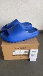 Yeezy slide azure maat 42, Kleding | Heren, Schoenen, Slippers, Blauw, Nieuw, Ophalen of Verzenden