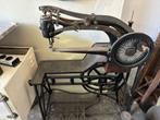 antieke leder naai machine, Ophalen